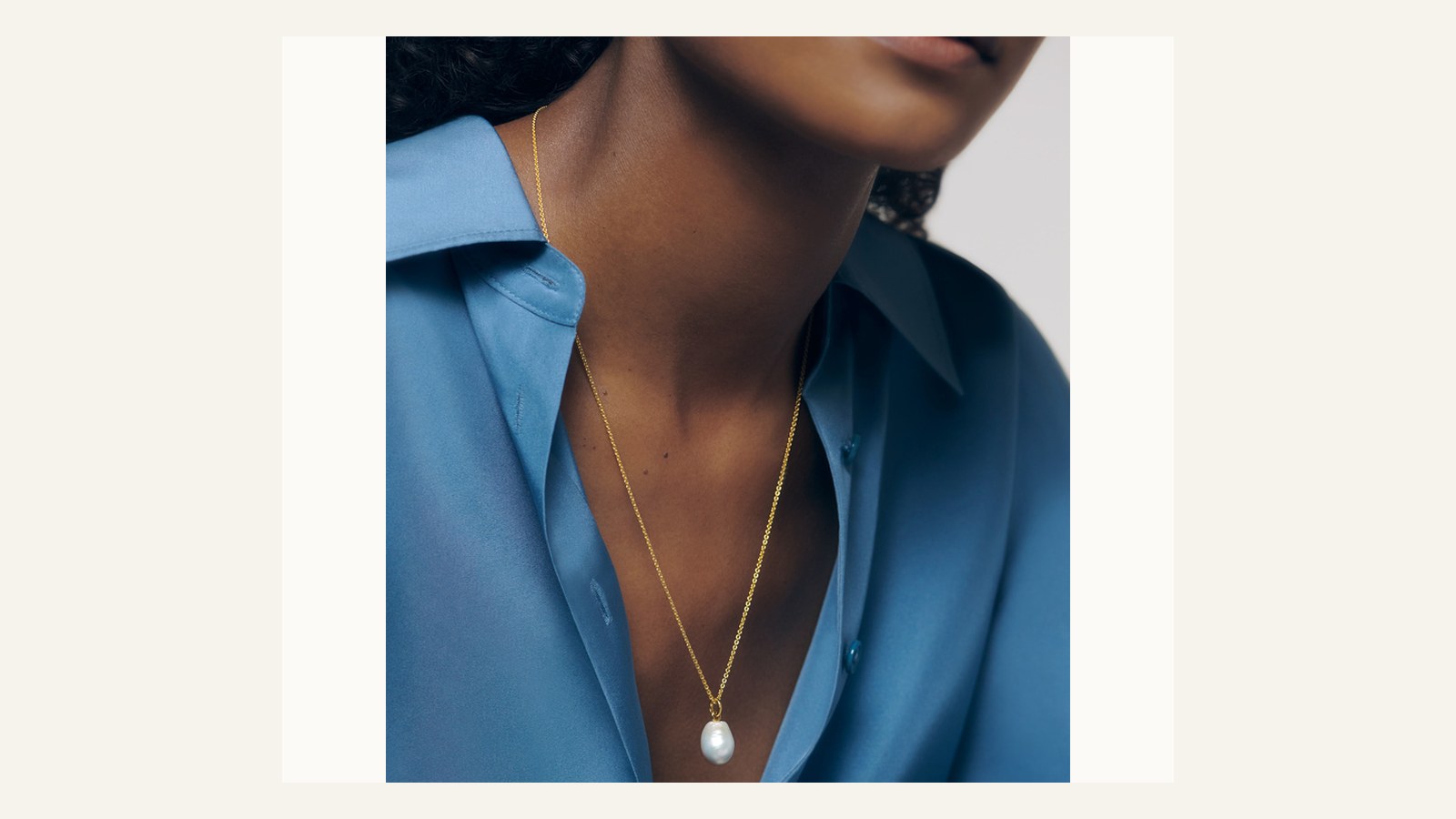 Monica Vinader Nura Pearl Necklace worn with a blue shirt