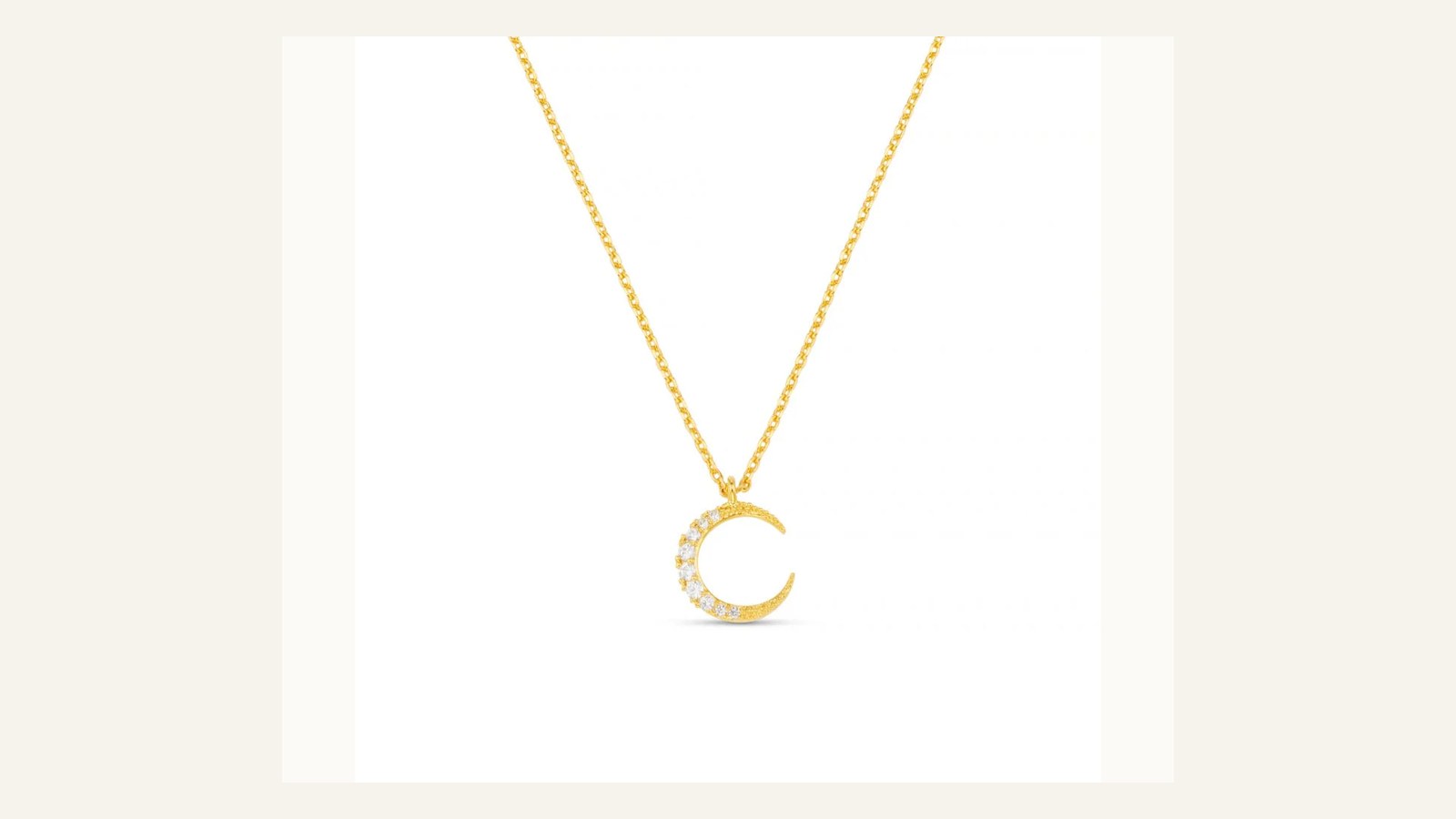 Orelia Pavé Moon Charm Necklace displayed in a gift box